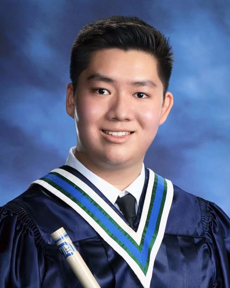 Kaiwen Yang, smiling, in a University of Toronto convocation gown.